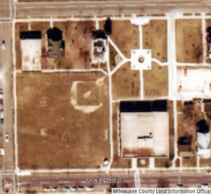 An aerial view of the Concordia campus showing the space between West State Street and West Highland Boulevard. There is a baseball diamond situated here.