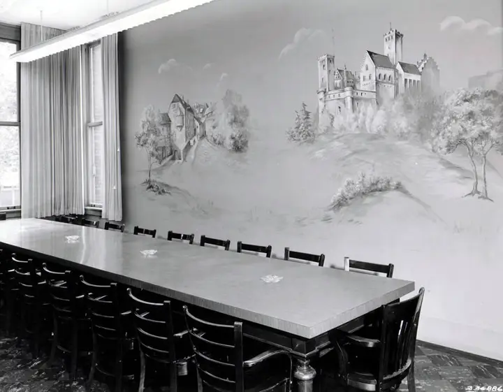 Mural painted on the wall of a conference room. The mural contains some trees along with two old castles behind them. ￼ In 1881 Concordia College held their first class in the basement of Trinity Lutheran Church at 9th and Highland Avenue in downtown Milwaukee. Image © Colin White ￼ The following year they moved west to their new campus. As shown in the 1890 Baist's Property Atlas, the campus borders were North 31st Street, North 33rd Street, West State Street and West Wells Street. It appears that at the time the Milwaukee & Watertown Plank Road still ran along the northern edge of campus. Image © Milwaukee County Land Information Office ￼ A non-distorted view of the campus buildings courtesy of the 1894 Sanborn Fire Insurance Map. Image © Milwaukee County Land Information Office ￼ The 1910 Sanborn Map presents more development in the area as the plank road was removed and more homes were built. Image © Milwaukee County Land Information Office ￼ The Concordia College campus (highlighted in blue) is 5 blocks east of the Miller Brewery and 13 blocks west of Marquette University's western edge. Image © Colin White; © Concordia University Wisconsin; © Molson Coors; © Marquette University ￼ Emil Hamman was the chair and professor of mathematics and science at the college. He served as interim president from 1882-1885. Image © Concordia University Wisconsin ￼ Chr. Loeber, the son of a Concordia founder named Henry Loeber, served as president from 1885-1893. Recent students will recognize this name from Loeber Hall at Concordia University Wisconsin's campus in Mequon. Image © Concordia University Wisconsin ￼ In 1990, seven years after Concordia College left for Mequon, the Forest County Potawatomi Community purchased the land after which they leased it to the Indian Community School. After the school relocated to Franklin in 2007, the Potawatomi evaluated the building conditions and created a long term restoration plan for the newly renamed Wgema Campus. All of the buildings were considered to be in poor shape and required extensive renovations. Image © Colin White ￼ Concordia College president Max Albrecht served from 1893-1921. Afterwards he continued on as a professor of Latin and Greek studies until 1932. Image © Concordia University Wisconsin ￼ Recitation Hall was built in 1900 using a design by architect Eugene Liebert. Eventually the building was renamed in honor of the longtime president and professor as Albrecht Hall. Image © Concordia University Wisconsin ￼ During the warm season of the year, the Kilbourn entrance to Albrecht Hall had a flower bed in front that spell out 