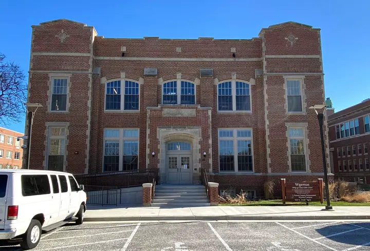 Straight on picture of the front of the 2 story brick building with 