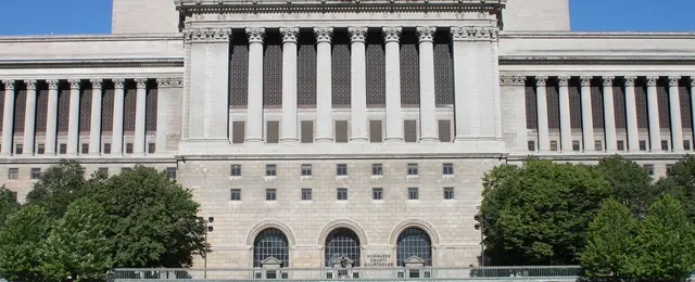 Milwaukee County Courthouse east side. Tall columned limestone building.