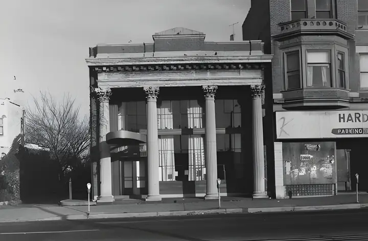 Old neoclassical columned bank building.